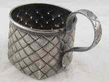 Appraisal: A Russian silver tea glass holder of basket weave design