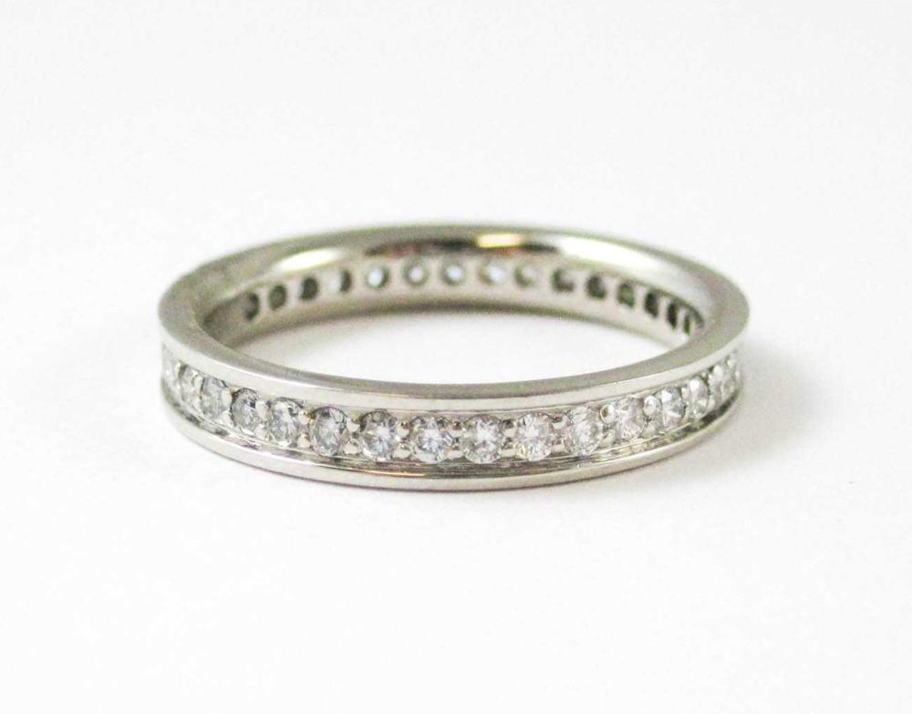 Appraisal: DIAMOND AND PLATINUM ETERNITY BAND set with round-cut diamonds together