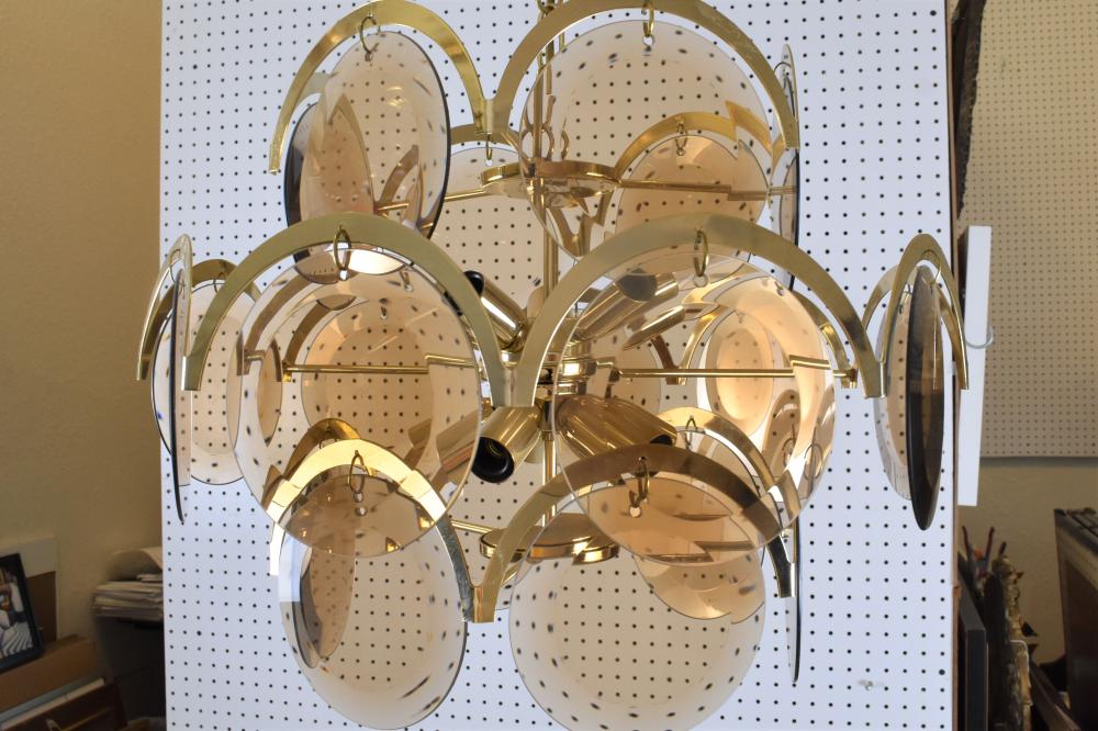 Appraisal: LOT A - CONTEMPORARY BRASS GLASS MULTI-LIGHT CHANDELIERThe center shaft