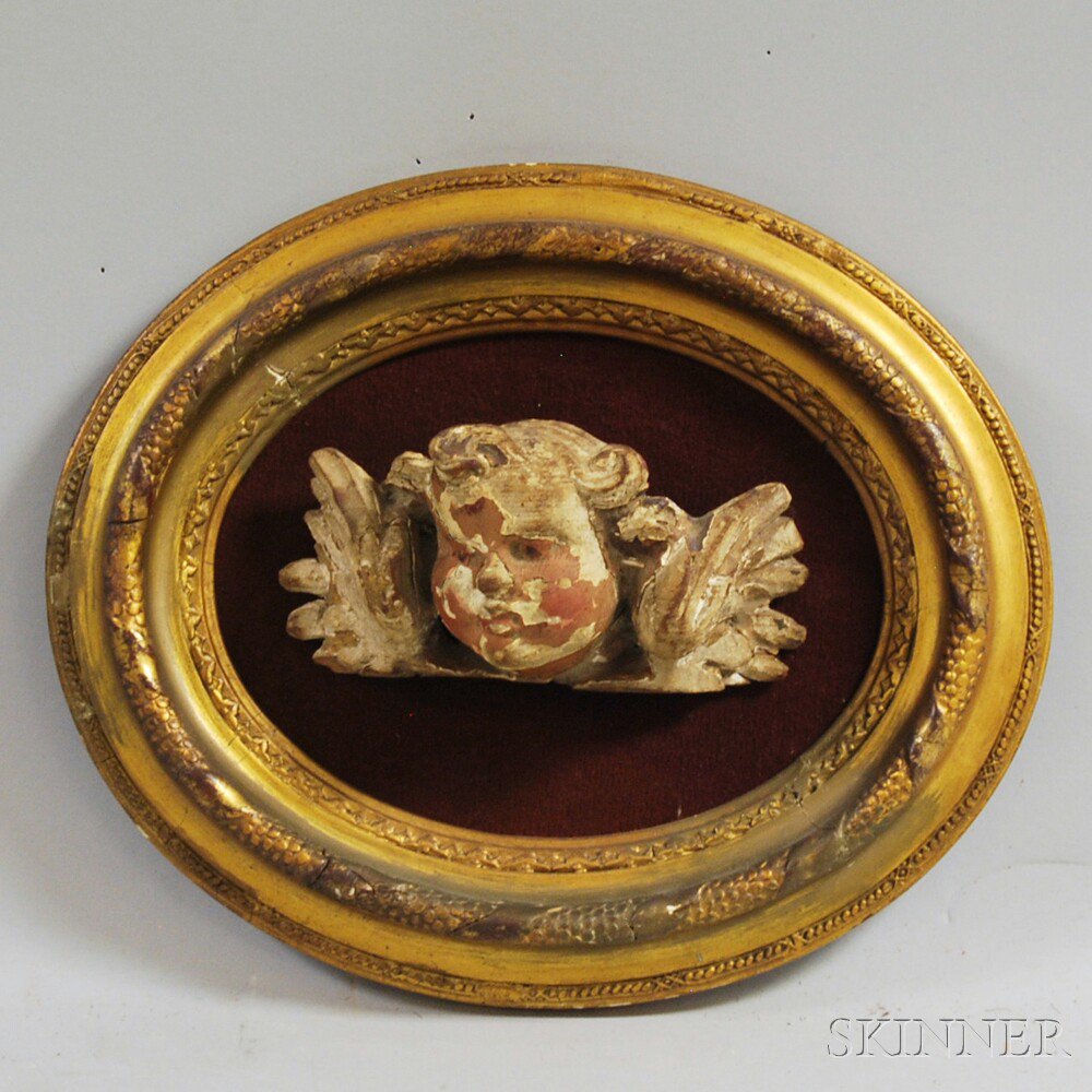 Appraisal: Carved Wood and Gesso Plaque of a Putto Head with