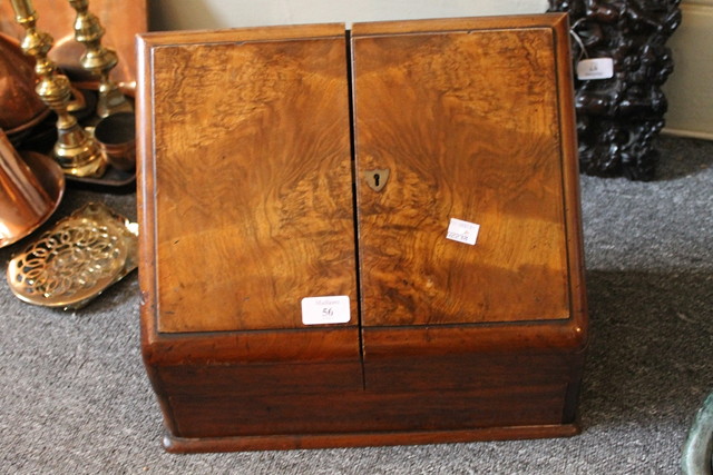 Appraisal: A VICTORIAN WALNUT STATIONERY BOX with fitted interior