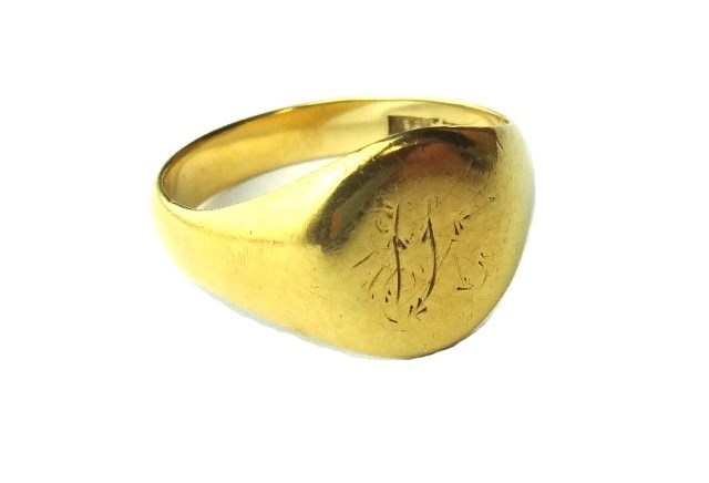 Appraisal: A gold oval signet ring detailed CT ring size Q