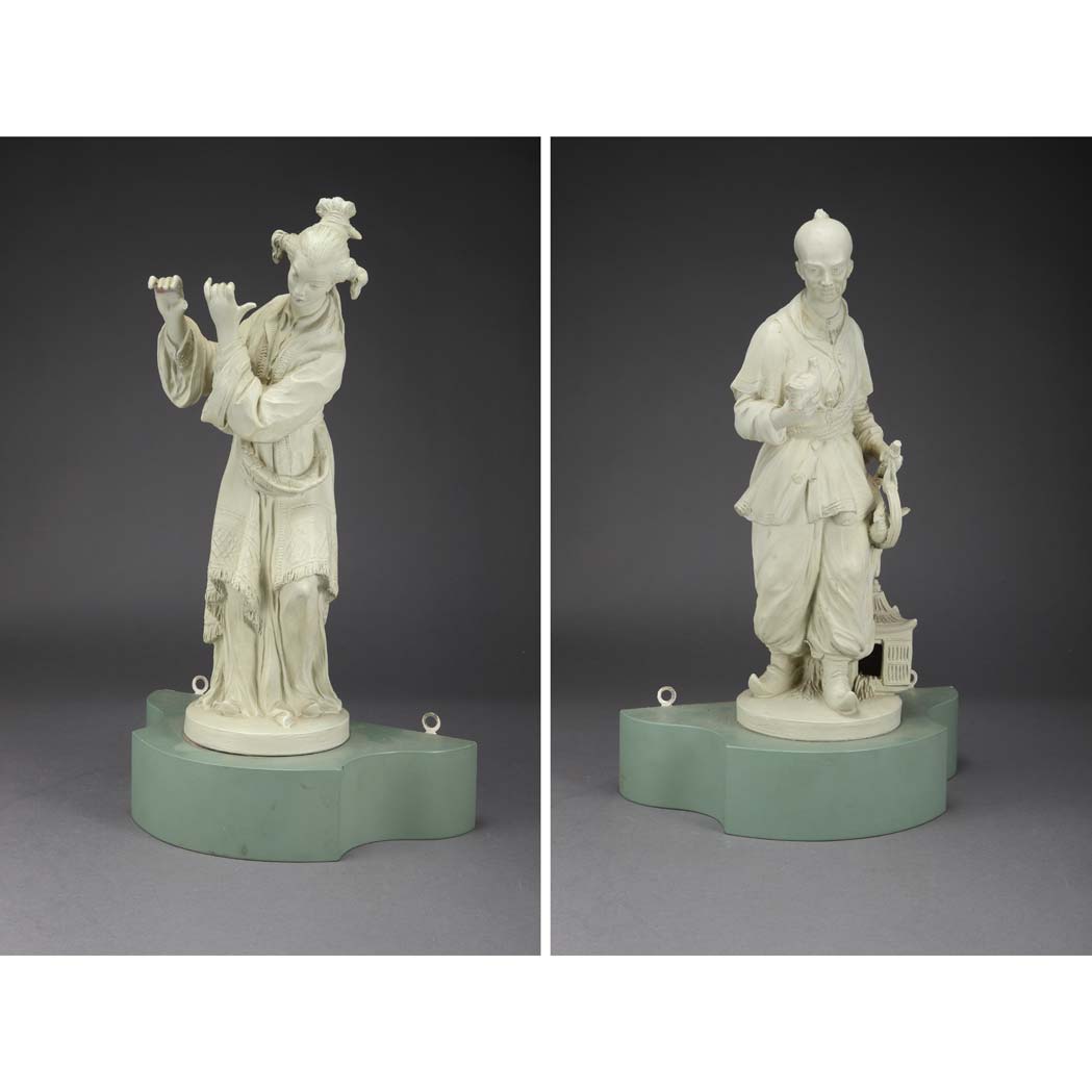 Appraisal: Pair of German Terra Cotta Chinoiserie Figures Depicting a male