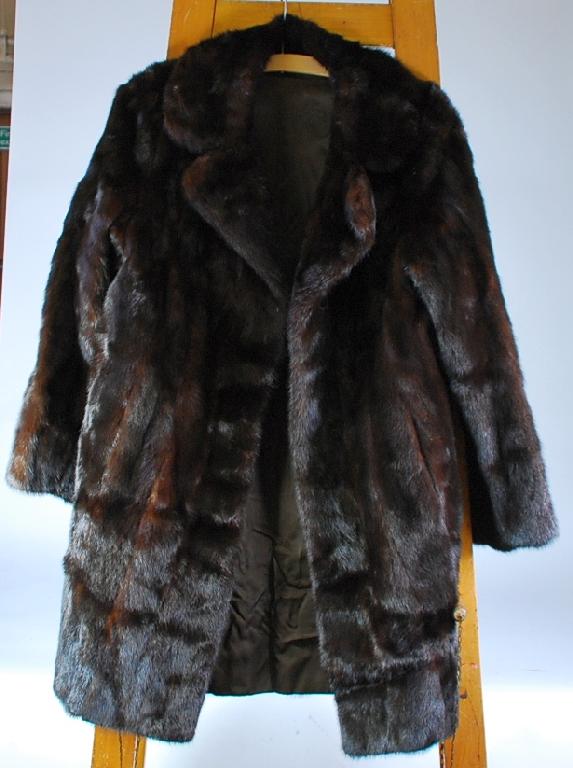 Appraisal: DARK BROWN MINK THREE QUARTER LENGTH FUR COAT with revered