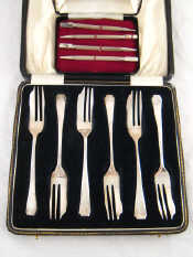 Appraisal: A cased set of six silver pastry forks Sheffield and