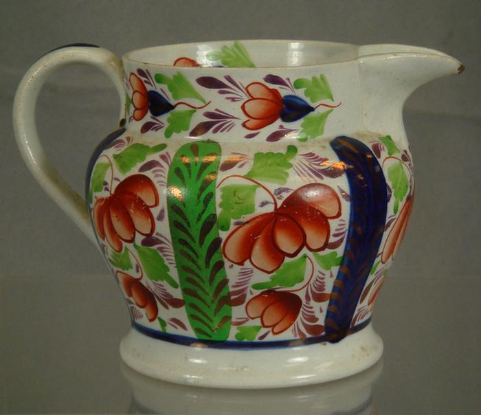 Appraisal: Gaudy Welsh pitcher grape pattern flake on spout Estimate -