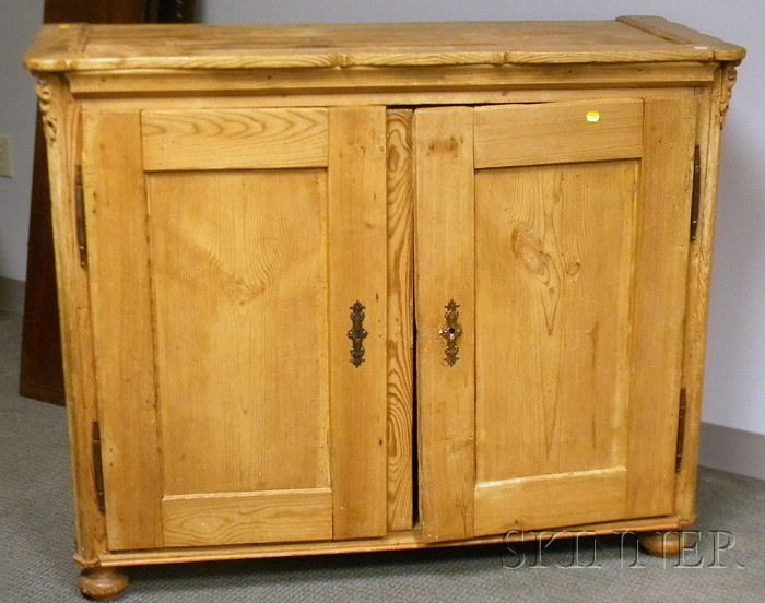 Appraisal: Provincial Carved Pine Two-Door Side Cabinet with divided compartment interior