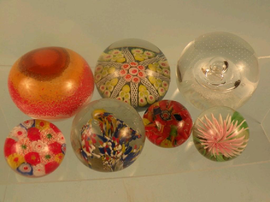 Appraisal: A Millefiori paperweight with a star shaped decoration to the