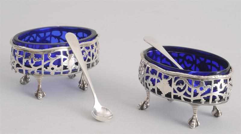 Appraisal: PAIR OF GEORGE III SILVER SALTS WITH BLUE GLASS LINERS