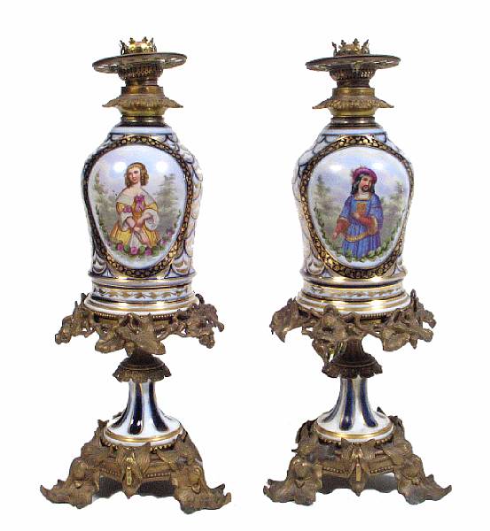 Appraisal: A pair of French style painted glass lamps with bronze