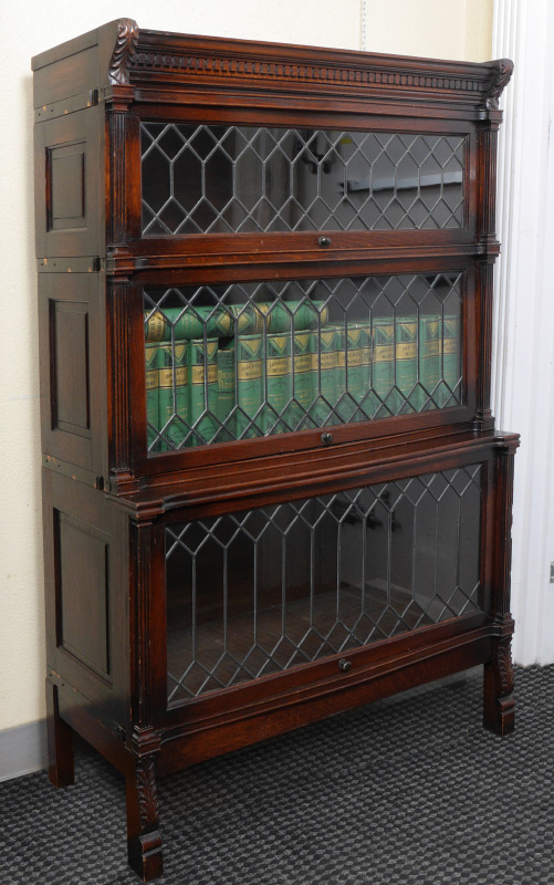 Appraisal: STACK LEADED BARRISTER BOOKCASE Carved top with dentil molding graduated