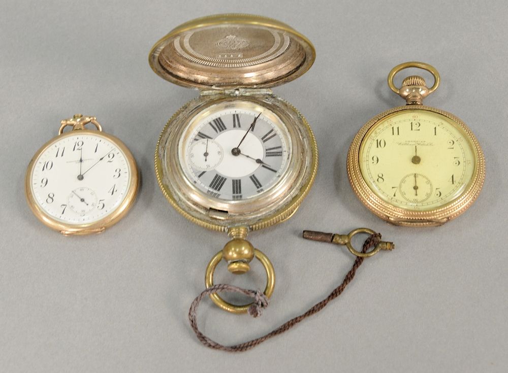 Appraisal: Three pocket watches including a large key wind with silver