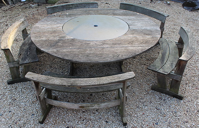 Appraisal: A LARGE OAK CIRCULAR GARDEN TABLE with central slate insert