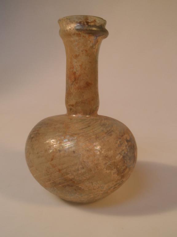 Appraisal: A late Roman flask made in green glass the wide