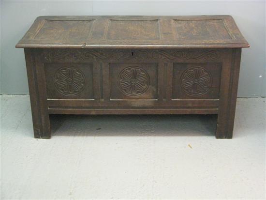 Appraisal: A th century oak coffer with later carved front the