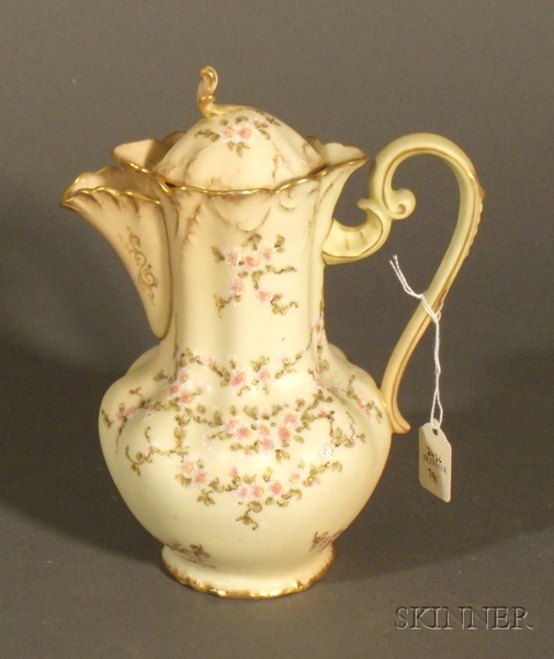 Appraisal: Rudolstadt Porcelain Coffeepot and Cover Germany c ivory ground with