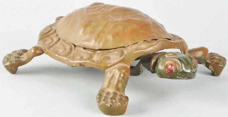 Appraisal: Figural Cast Iron Turtle Spittoon Description Working Brass insert Condition