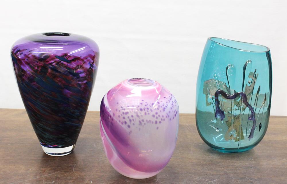 Appraisal: THREE MICHELLE KAPTUR ART GLASS VASES various forms and motifs