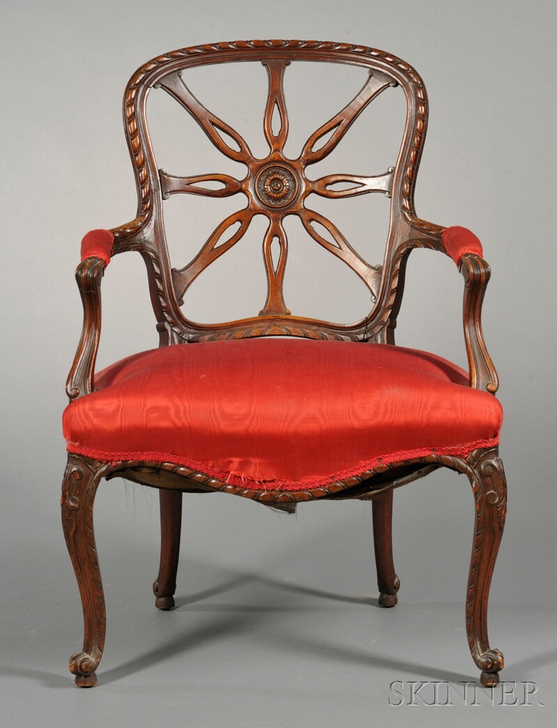 Appraisal: George III-style Spider-back Armchair circular back centered by a carved