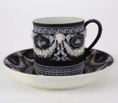 Appraisal: A Wedgwood Jasperware two-colour coffee can and saucer circa impressed