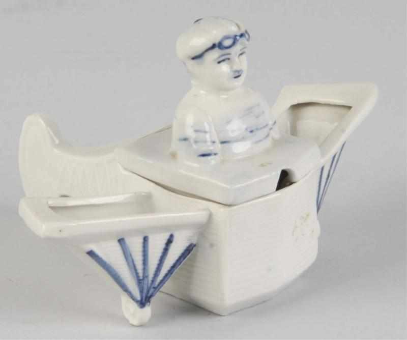 Appraisal: Unusual Porcelain Airplane Mustard Dish Description Unmarked but likely German