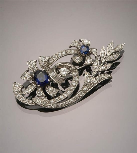 Appraisal: Tested Platinum Diamond and Blue Sapphire Brooch The floral spray