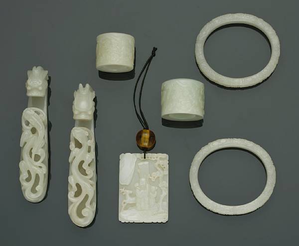 Appraisal: A group of seven white jade carvings th Century and