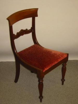 Appraisal: A VICTORIAN WALNUT FRAMED SPOONBACK ARMCHAIR