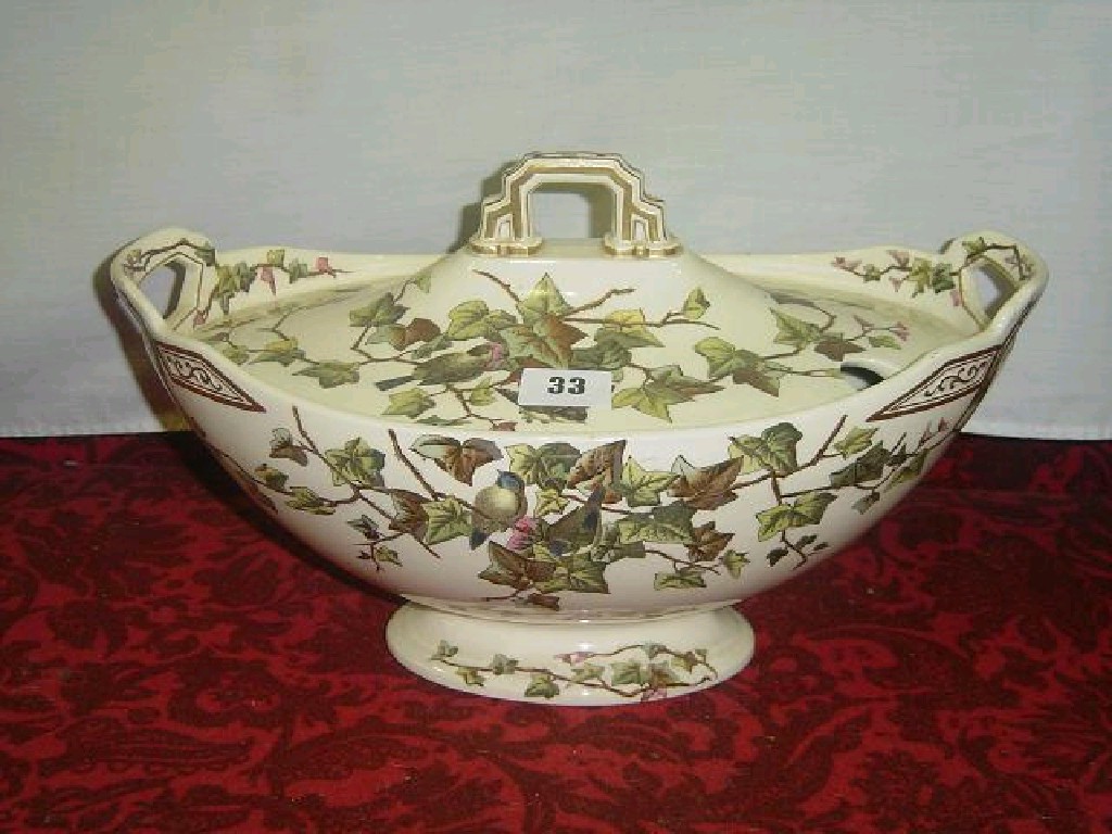 Appraisal: A Victorian cream ground tureen and cover of oval form