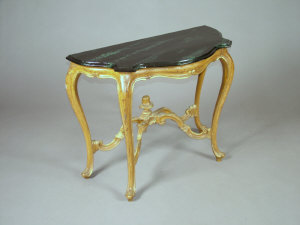 Appraisal: A gilt and black painted console table late th century