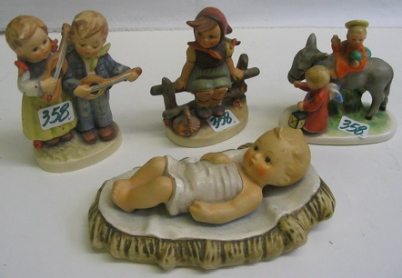 Appraisal: A GROUP OF HUMMEL FIGURES AND A GERMAN FIGURE The