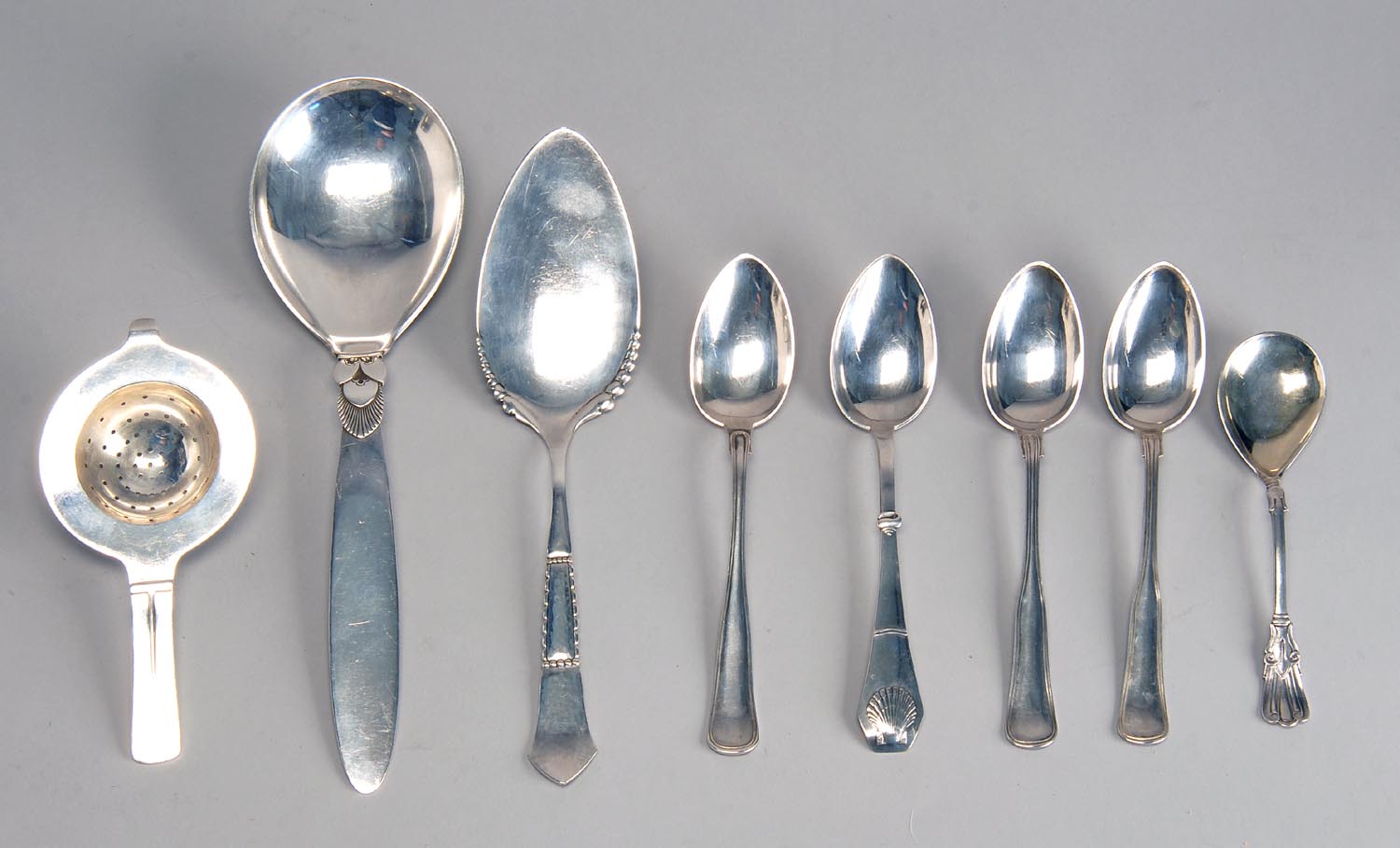 Appraisal: GEORG JENSEN STERLING SILVER SERVING SPOON Together with a tea