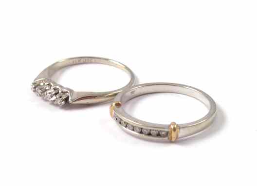 Appraisal: TWO DIAMOND AND WHITE GOLD RINGS K version set with