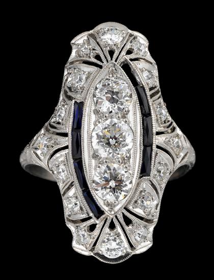 Appraisal: Platinum diamond and sapphire ringNavette form set with three Old