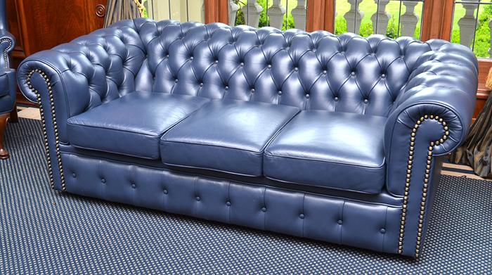 Appraisal: LEATHER UPHOLSTERED CHESTERFIELD STYLE THREE SEAT COUCH