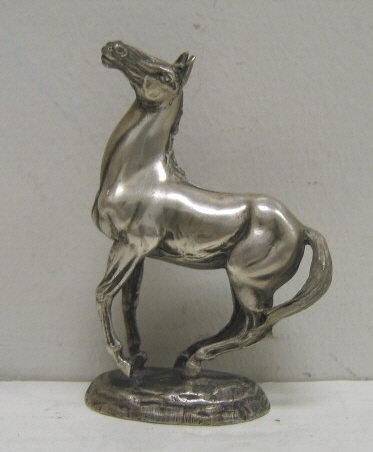 Appraisal: AFTER LORNE MCKEAN BRITISH Silver horse statue impressed artist signature