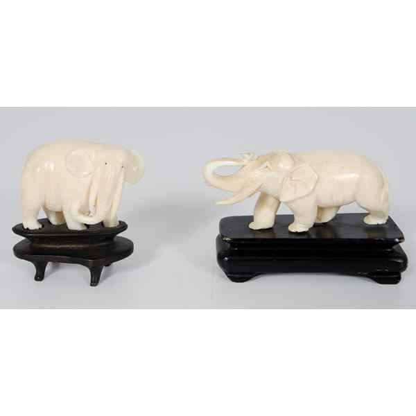 Appraisal: Ivory Elephants th century Two carved ivory elephants both unmarked