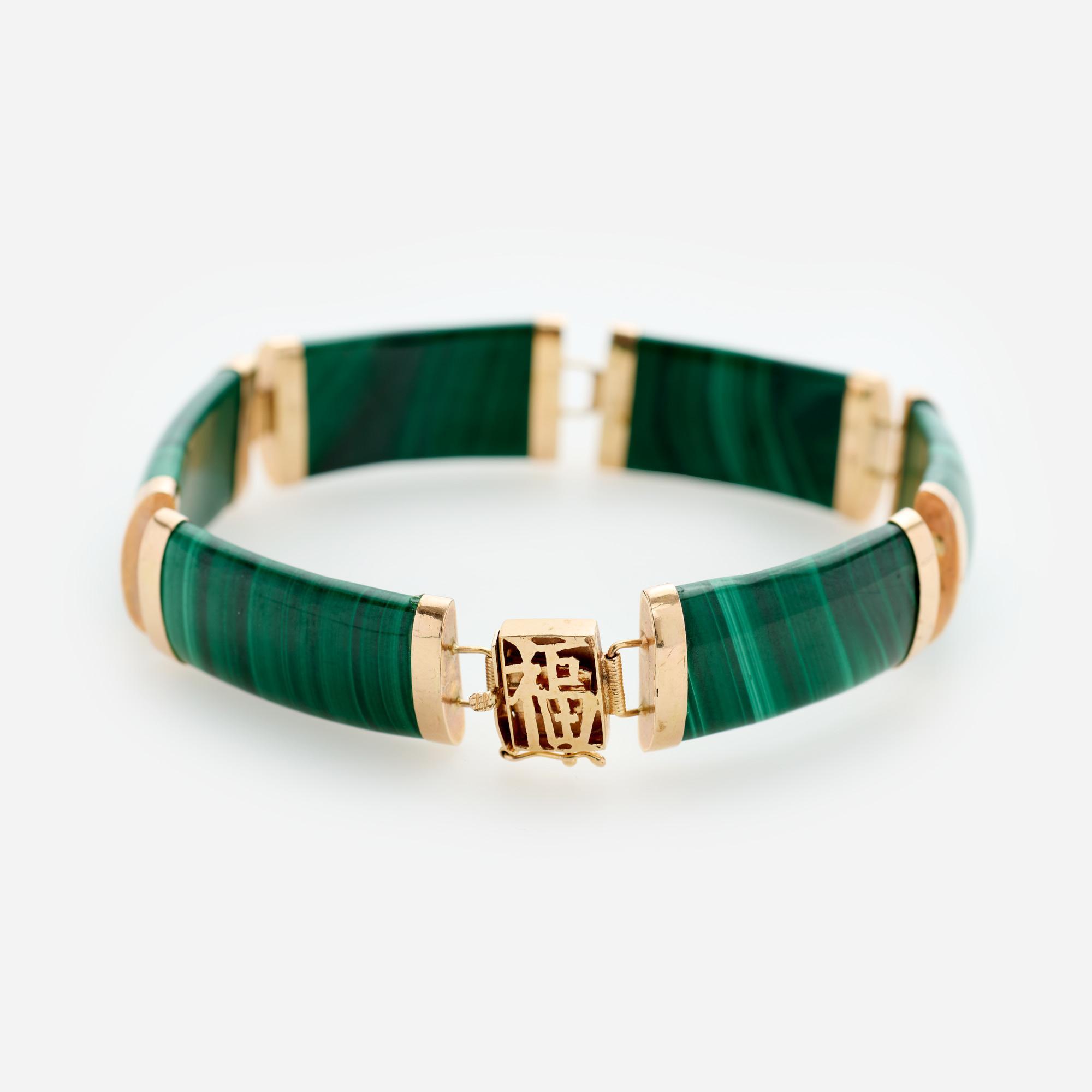 Appraisal: K MALACHITE LUCKY LINK BRACELET A k yellow gold and