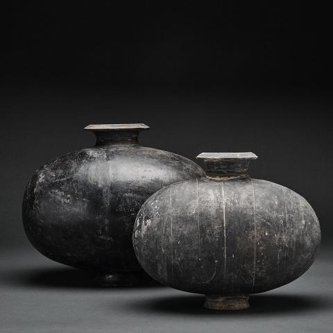 Appraisal: Two Pottery Cocoon Jars Han Dynasty BC AD Each well