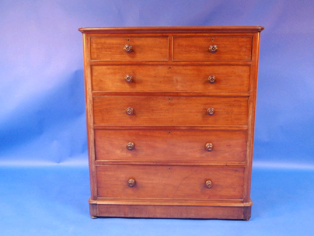 Appraisal: A Victorian plum pudding mahogany chest of two short and