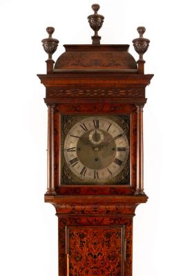 Appraisal: A Maple Co longcase clock the hood with three urn