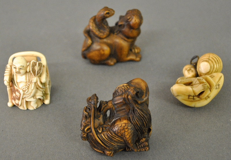 Appraisal: - Four Netsuke sculptures two of boxwood and two of