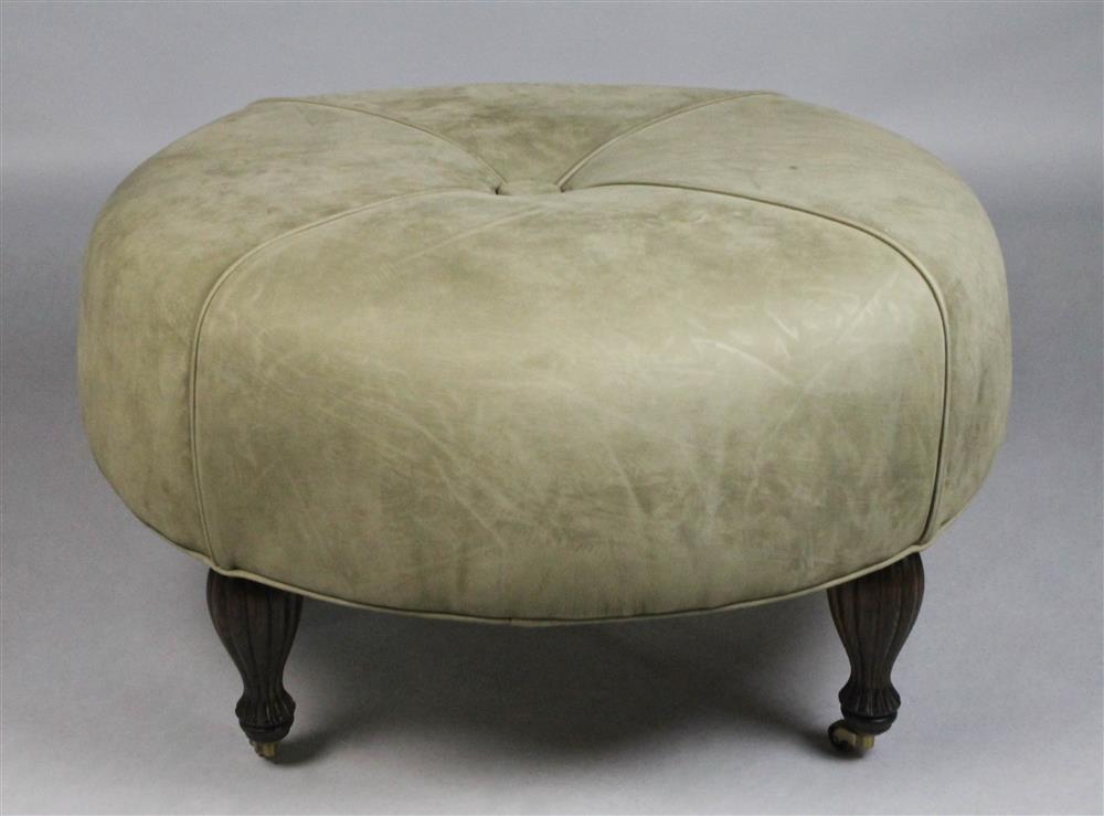 Appraisal: SWAIM COMPANY PALE GREEN-GREY SUEDE COVERED CIRCULAR OTTOMAN ON CASTERS