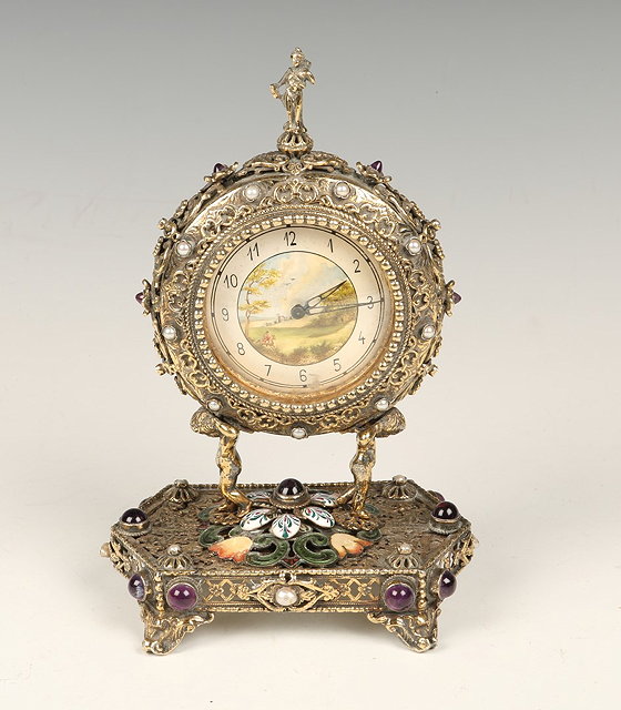 Appraisal: A VIENNESE SILVER GILT TABLE CLOCK with painted dial and