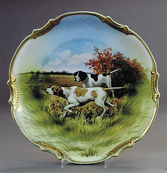 Appraisal: RK Beck hunting dog design porcelain charger th centurymolded gilt