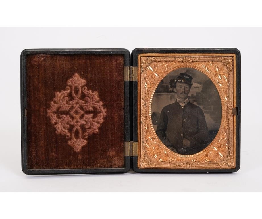 Appraisal: Tintype of a Union Civil War soldier wearing a kepi