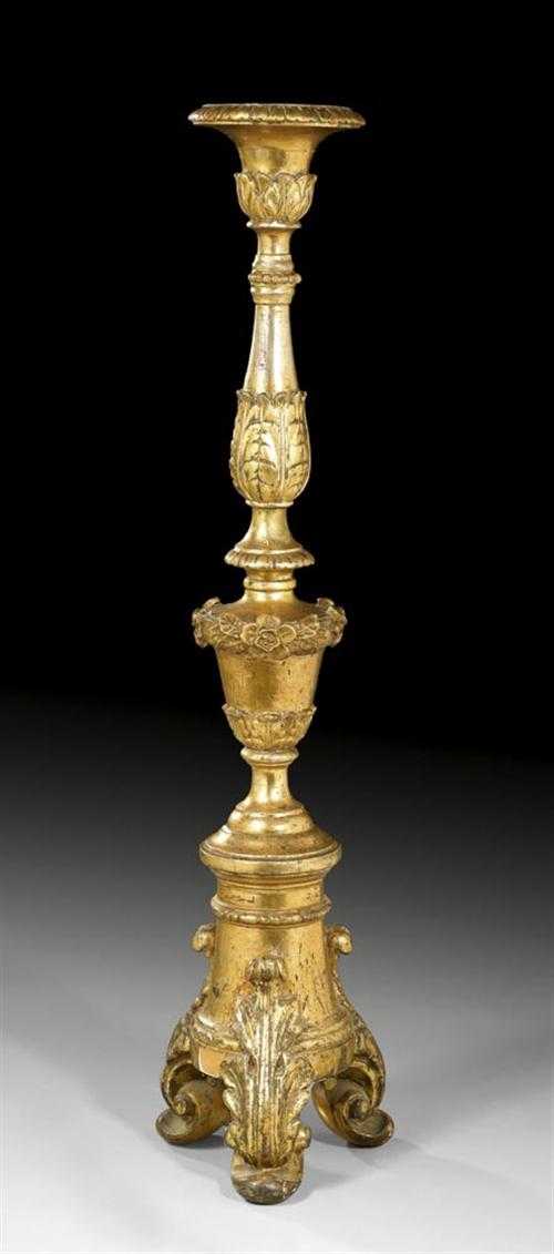 Appraisal: TALL CARVED GILTWOOD CANDLE HOLDER Baroque German th century With