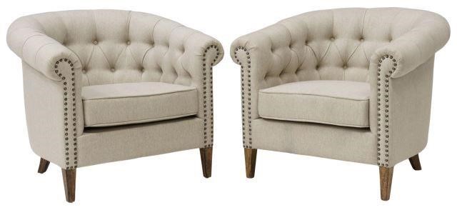 Appraisal: pair Upholstered club chairs late th c having curved button-tufted