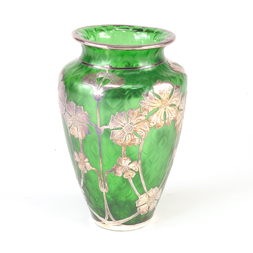 Appraisal: Art Nouveau emerald glass vase with silver overlay depicting wild