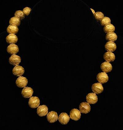 Appraisal: EARLY PERSIAN HOLLOW GOLD BEAD NECKLACE DECORATED WITH FISH Approx